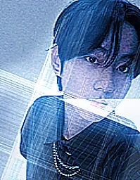 image description: the kpop idol jungwon from enhypen, taking a selfie. the picture is tinted blue and overlayed with sharp sparkles. end image description.